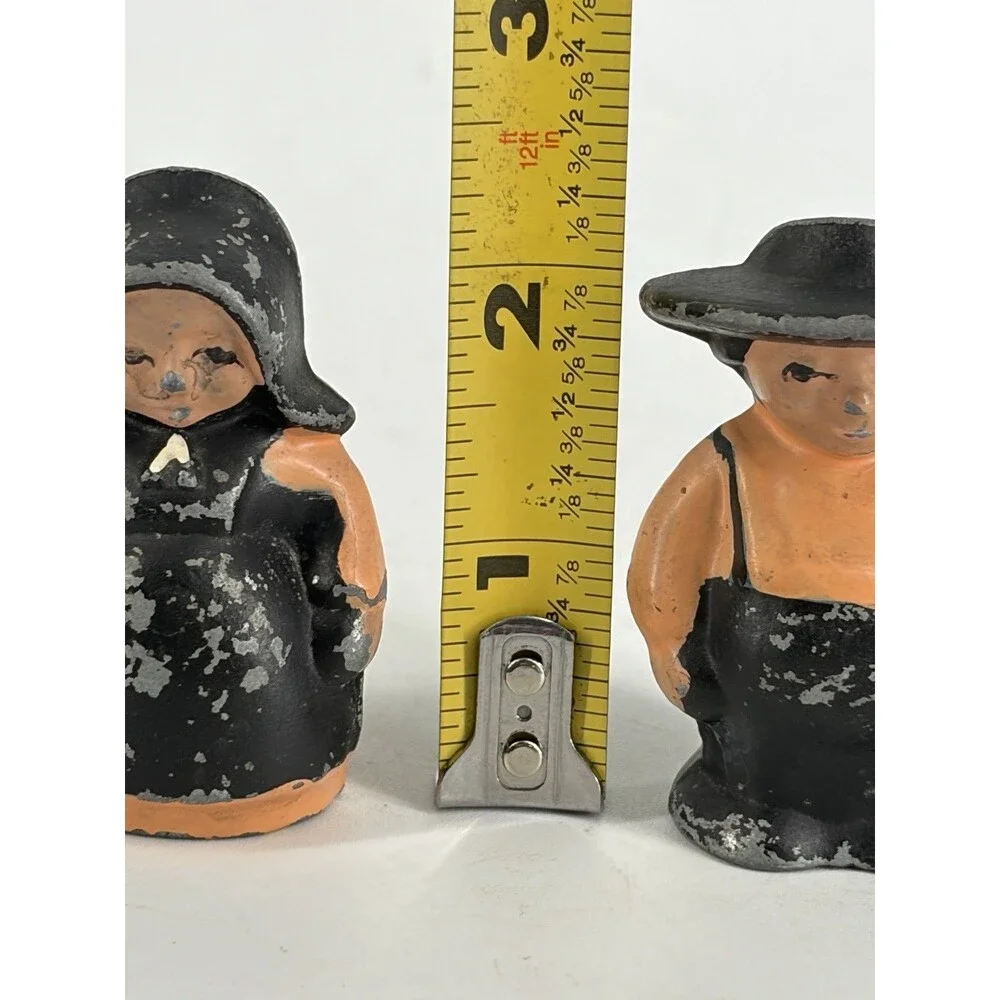 Vintage Cast Iron Salt & Pepper Shakers Amish Couple Man & Woman Peach Black